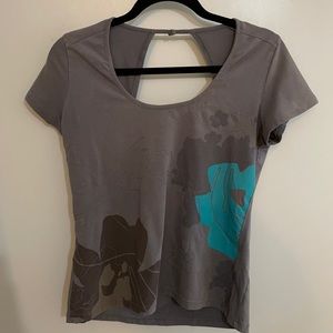 Sandwich t-shirt with cut-away feature on back.